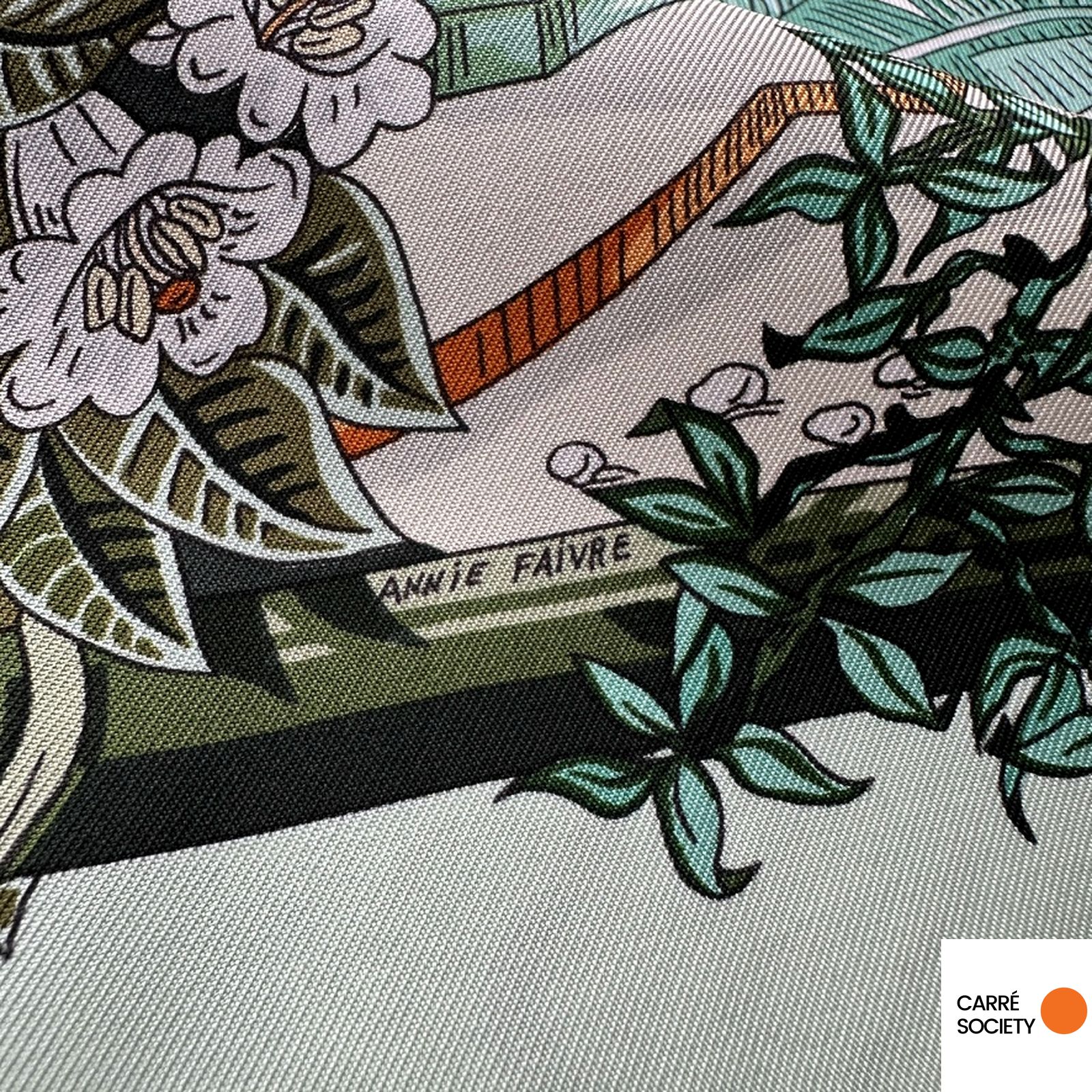 Étiquette de composition 100% soie du foulard Hermès Jardin d'Hiver d'Annie Faivre.