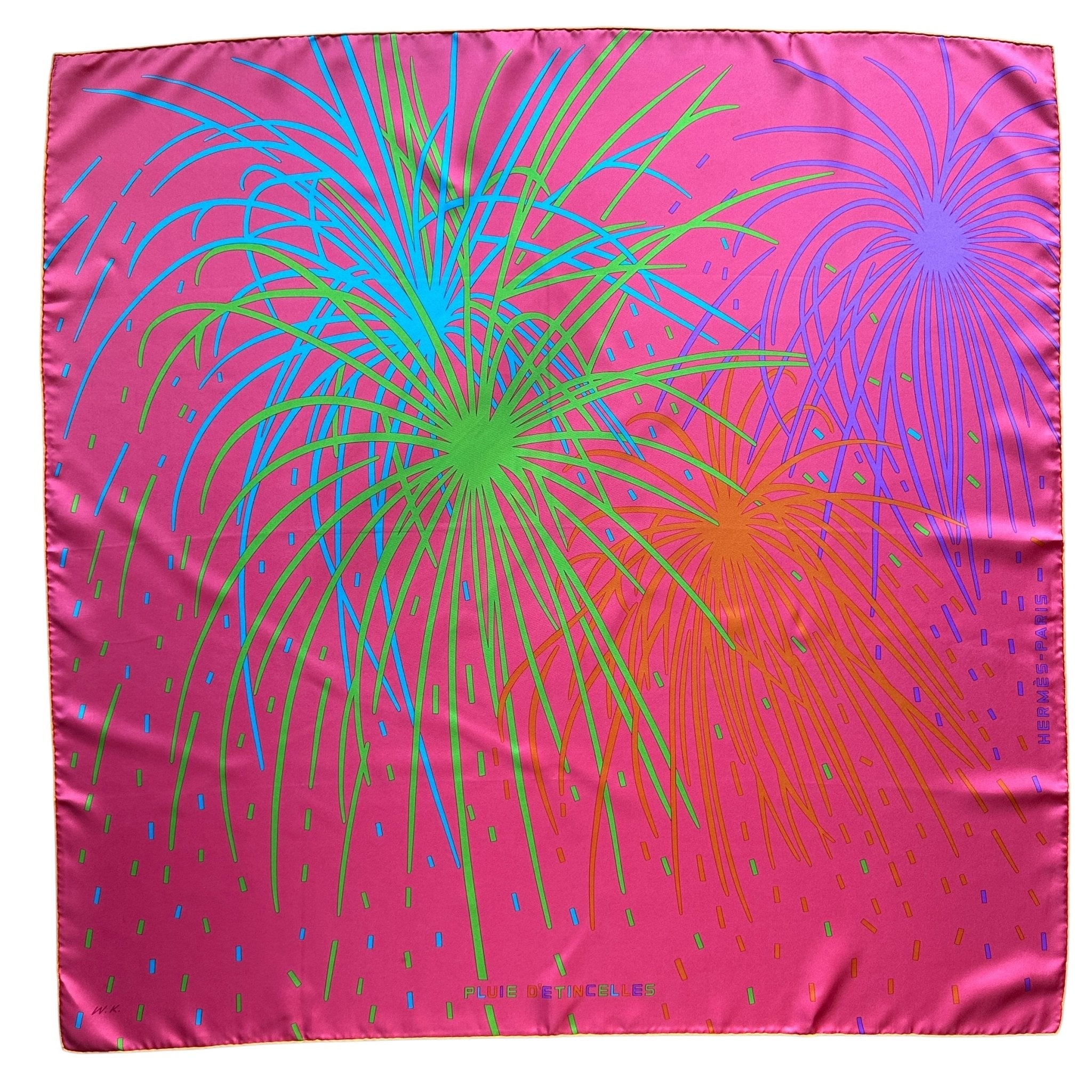 Vue générale du foulard Hermès intitulé Pluie d'Étincelles mettant en valeur la palette éclatante de ce carré, rose shocking vert fluo. orange bleu turquoise